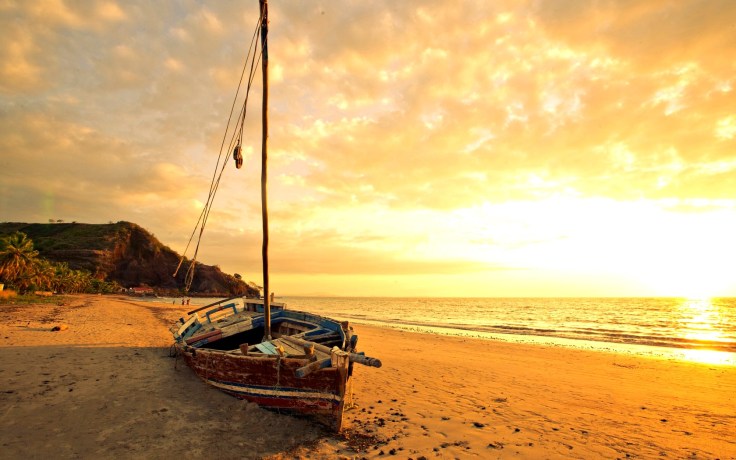 beaches-abandoned-boat-footprints-sunlight-ocean-peaceful-golden-waves-sunset-sun-sea-sunrise-sky-splendor-sand-boats-nature-beauty-beautiful-lovely-clouds-beach-free-wallpapers.jpg